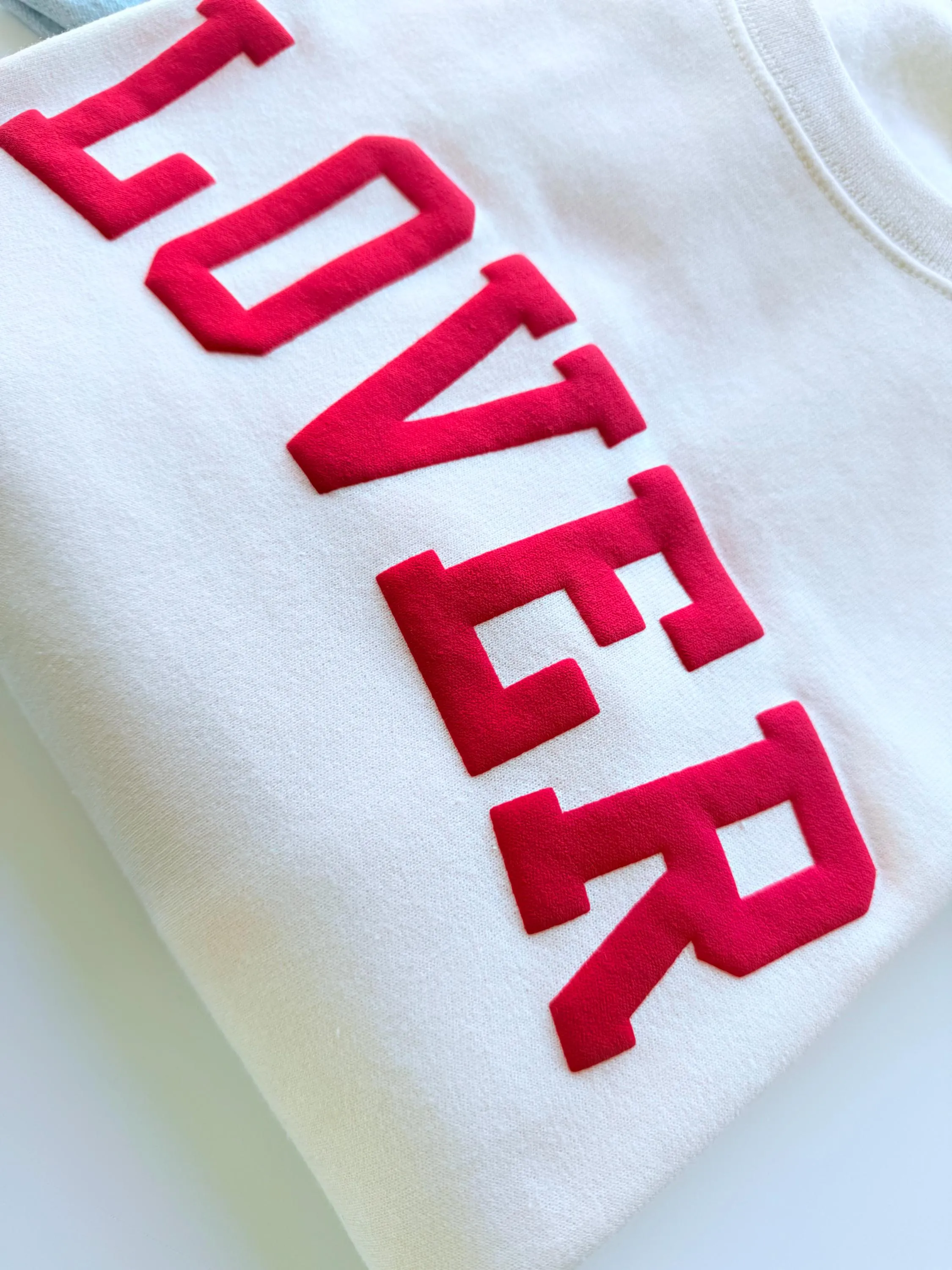 Embossed Puff Lover Varsity Sweatshirt