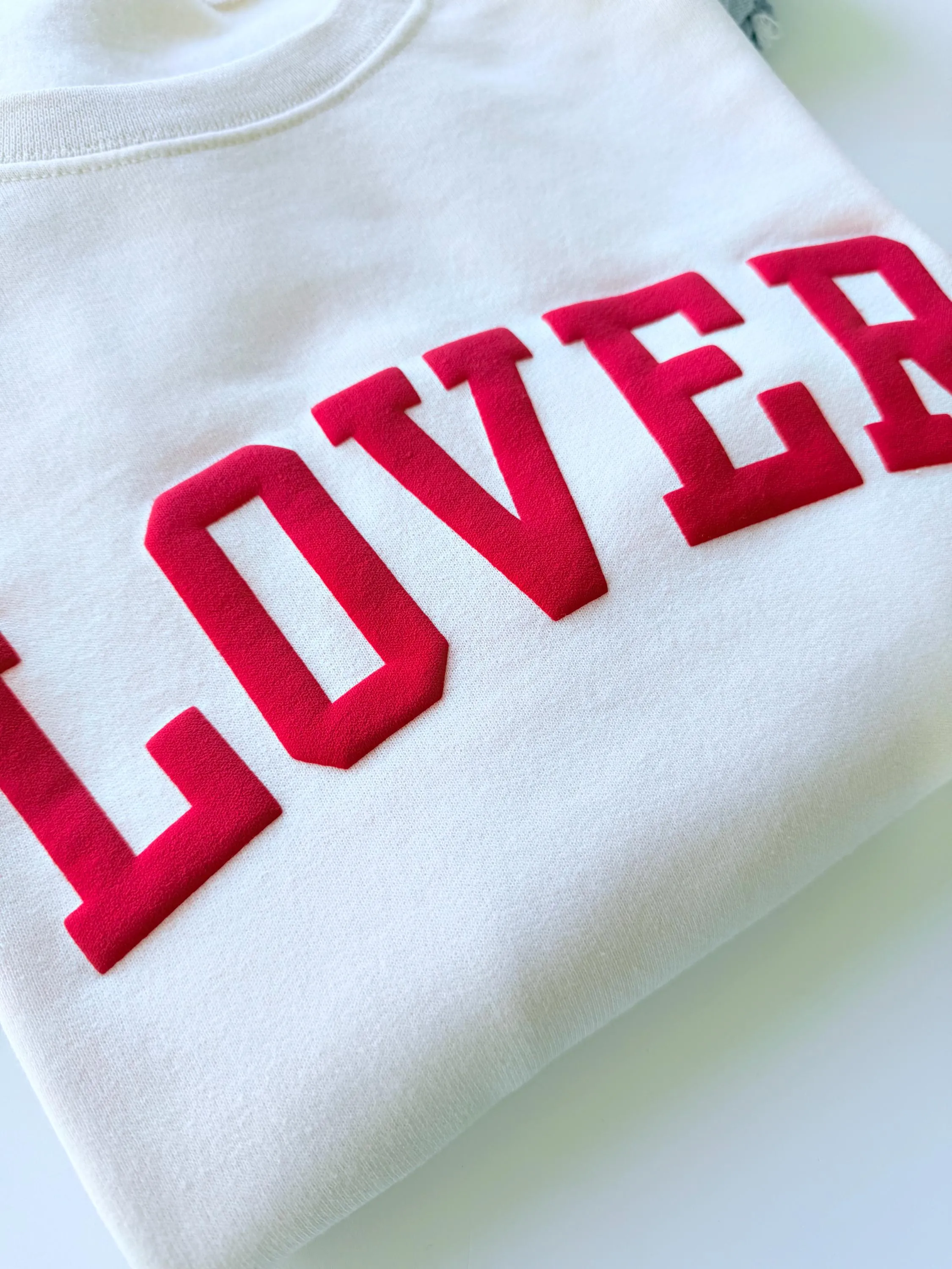 Embossed Puff Lover Varsity Sweatshirt