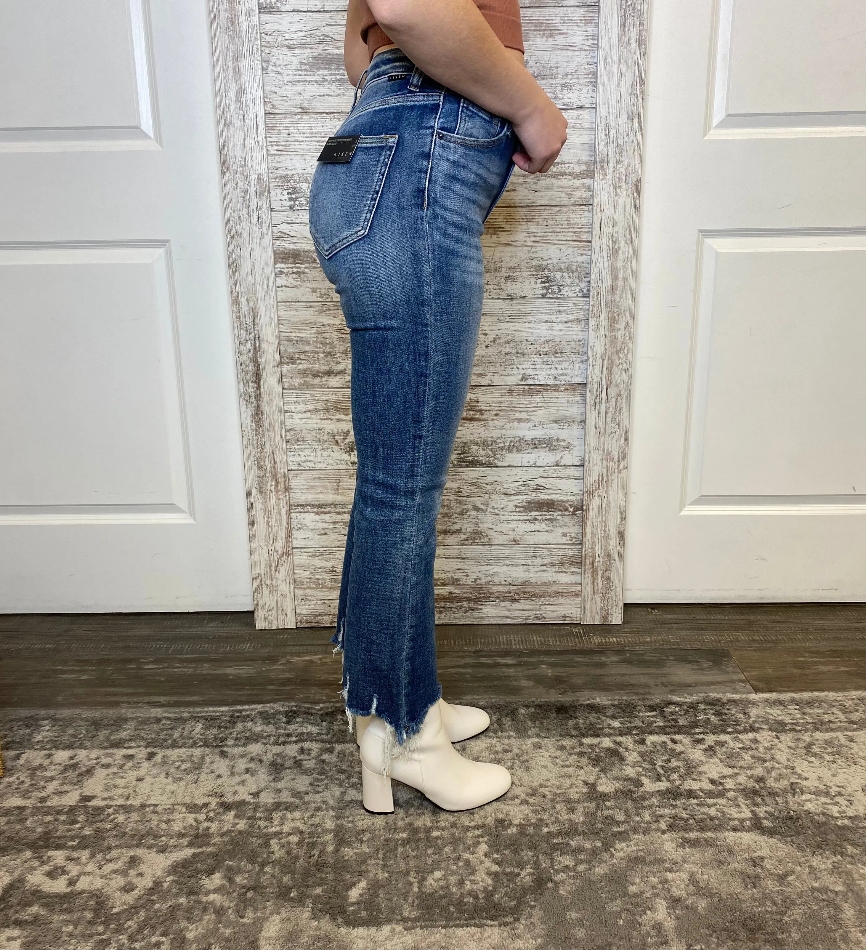 HIGH RISE RAW HEM ANKLE FLARE