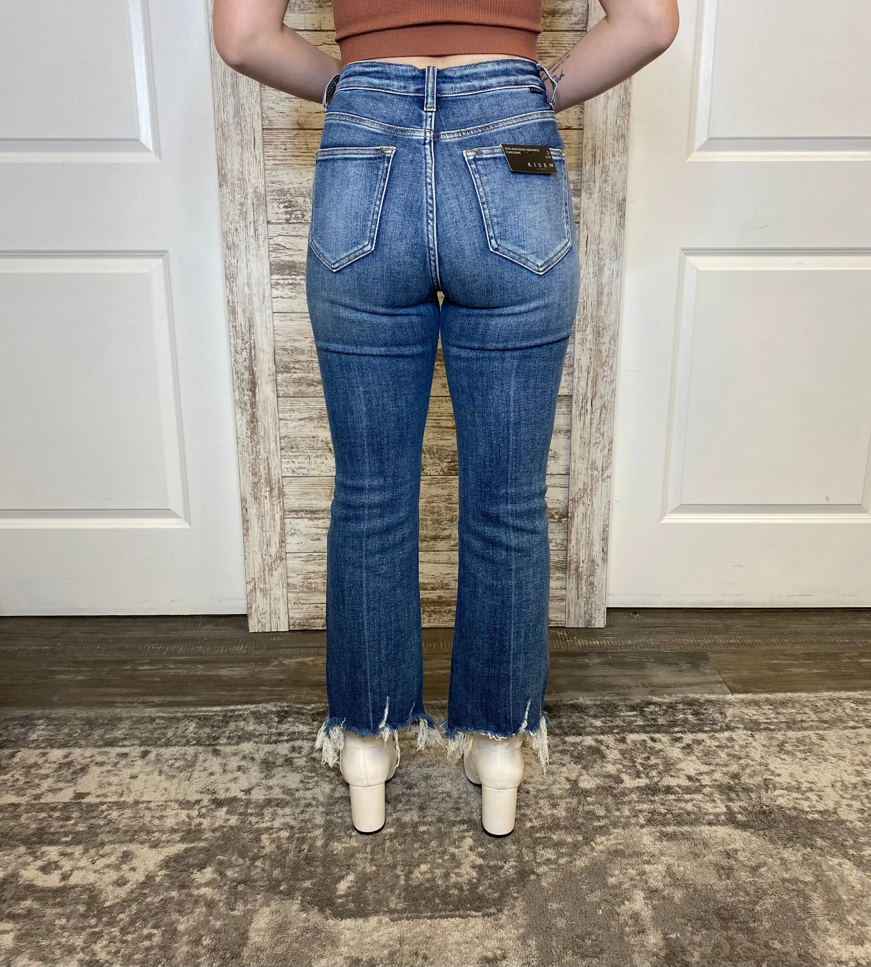 HIGH RISE RAW HEM ANKLE FLARE