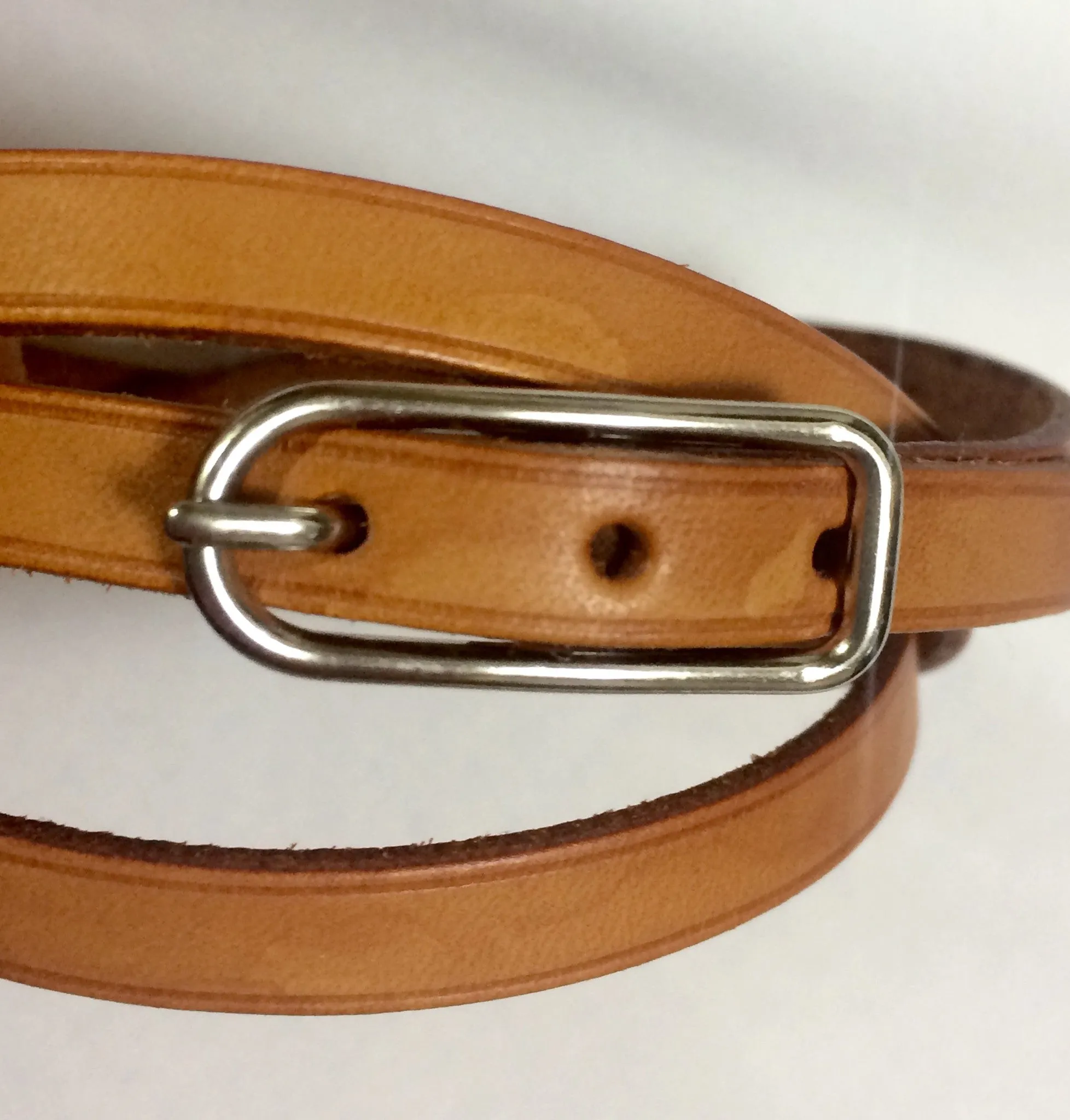 Vintage Hermes brown leather and silver buckle bracelet. Classic and casual jewelry from Hermes. 050407r11